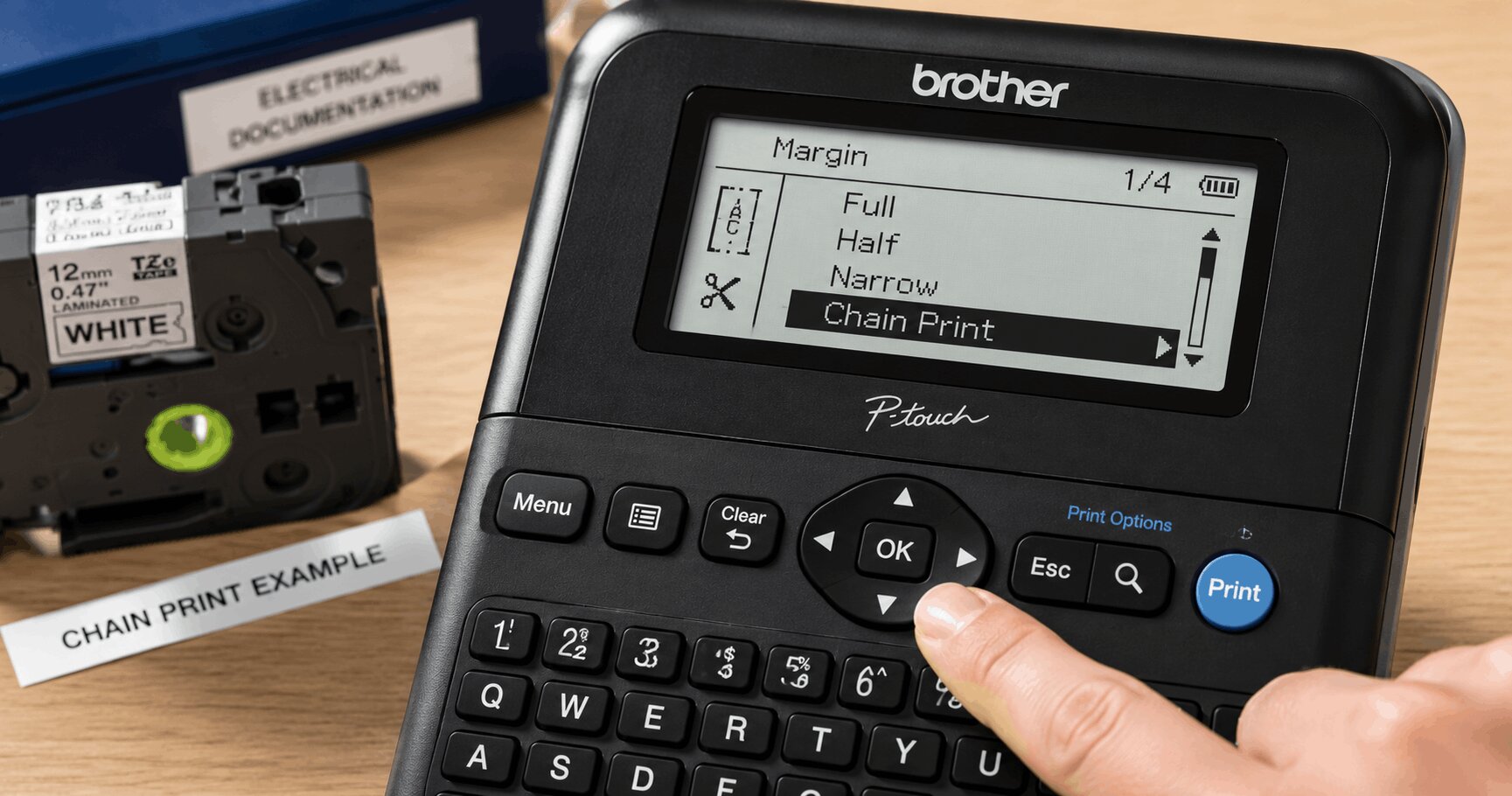 Close-up view of a Brother P-Touch label printer screen interface showing how to choose Chain Print within the margin options