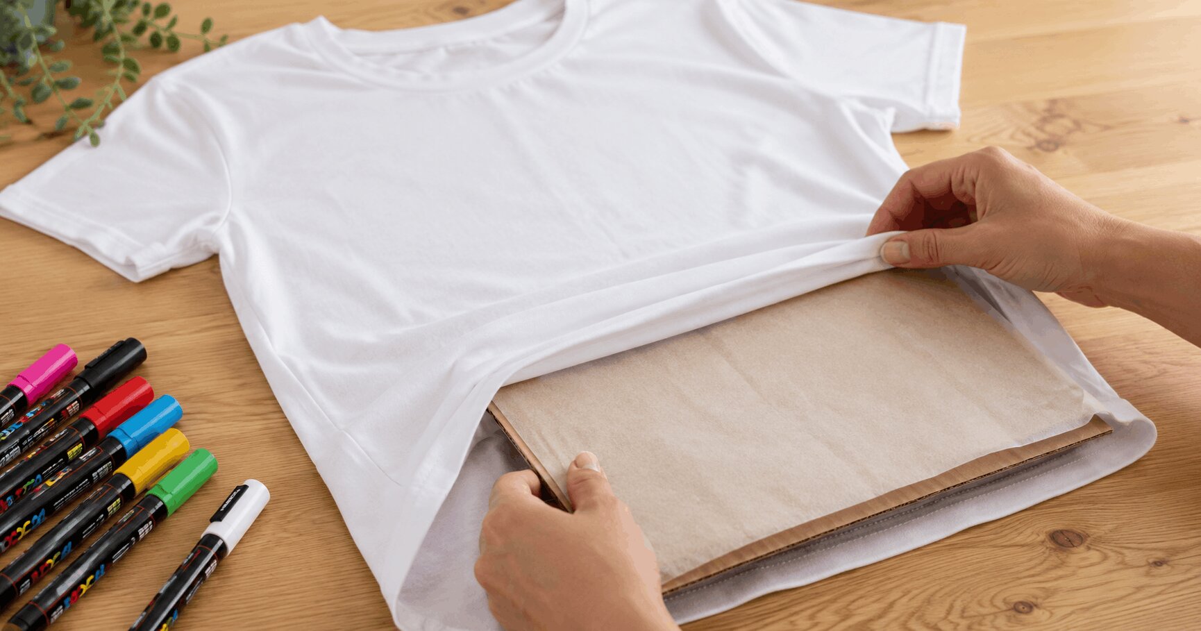 Cardboard bleed board wrapped in parchment paper inside a cotton t-shirt