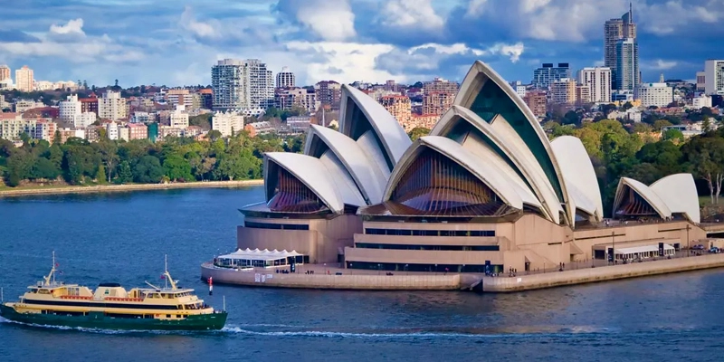 Vibrant ink and toner printer cartridges in an office with a view of Sydney